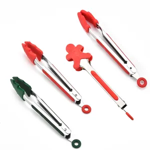 Set of stainless steel food tongs with red and green silicone tips in ginger man shape