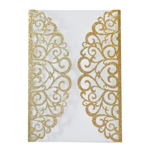 Detailed laser-cut scroll pattern on golden glitter wedding invitation cover