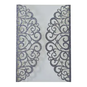 Intricate laser-cut lavender glitter invitation cover with heart patterns