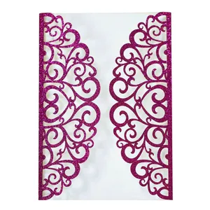 Macro detail of laser-cut glitter paper wedding invitation sleeve in vibrant rose pink