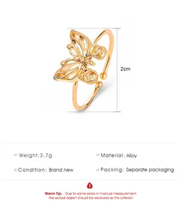 Detailed view of hollow butterfly open ring in gold finish with 3.7g weight and 2cm size