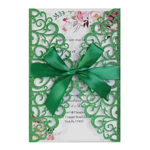 Forest green glitter laser-cut invitation set with matching wide satin ribbon bow