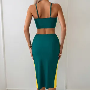 Rear view of three-piece green and yellow contrast swimsuit set with slim skirt
