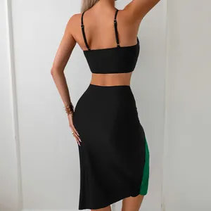 Back view of a black slim-fit tank top and midi bodycon skirt with green side panels