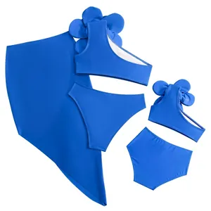 Royal blue three-piece matching family swimsuit with large 3D floral accent on shoulder