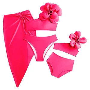 Matching flamingo pink mother and daughter swimwear set with large 3D floral accents