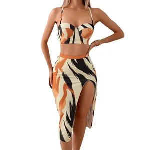 Three-piece bikini set with animal print crop top and high-slit long skirt for women