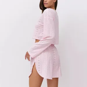 Detail of light pink eyelet fabric women's lounge set with side-slit high waist shorts