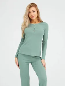 Close-up of ribbed knit texture and button Henley collar on sage green loungewear set