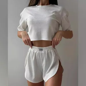 Women white ribbed loungewear set with crop top and drawstring shorts for casual home wear