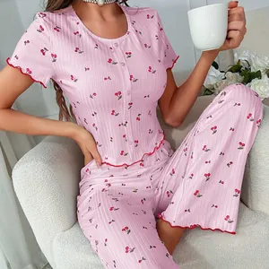 Pink cherry print pajama set with ruffle trim short sleeve top and long pants for women