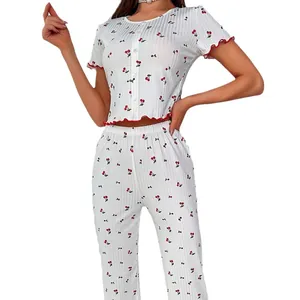 Women's two-piece cherry print pajama set with lettuce edge trim and ribbed texture