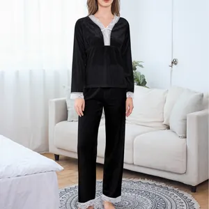 Women's black velvet pajama set with white lace trim, V-neck long sleeves and pants