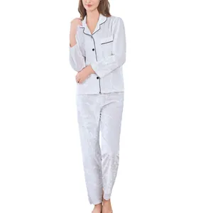 Women's velvet pajama set with long sleeves and black trim in silver white velvet