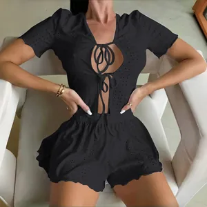 Women's black hollow out lace pajama set with lace-up short sleeve top and shorts
