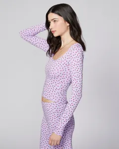 Slim fit long-sleeve pajama set with red floral print on light purple knitted fabric