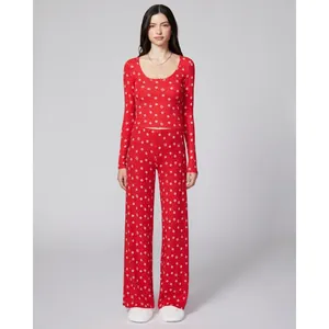 Women red Christmas pajama set with white snowflake prints and wide leg trousers