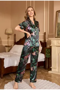 Women's silk pajamas set with tropical tiger print featuring short sleeves and long pants