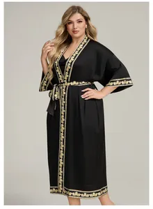 Luxurious black satin robe set featuring golden baroque patterns on cuffs and collar