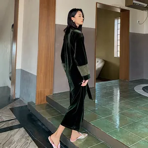 Luxurious dark green velvet bathrobe for women with long sleeves and elegant waist tie