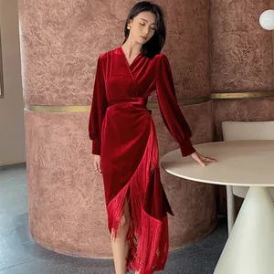Elegant wine red velvet robe for women featuring long tassels and a wrap V-neck design