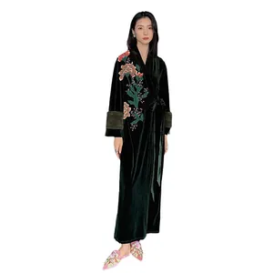 Luxurious dark green velvet bathrobe for women featuring floral embroidery and fur cuffs