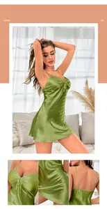 Close-up of green ice silk nightgown detailing V-neck drawstring and smooth satin fabric