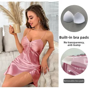 Detail of pink satin nightdress featuring removable chest pads and backless silk design