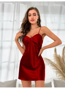 Detail of wine red ice silk nightgown featuring a pleated bust and delicate bow tie