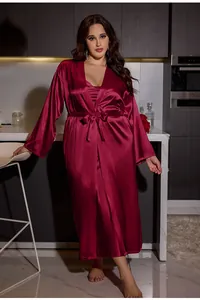 Detail of wine red silk robe and nightgown set with smooth satin texture finish