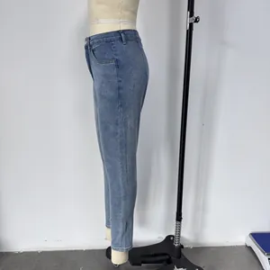Side view of slim fit blue stretch denim jeans showing pocket and stitching details