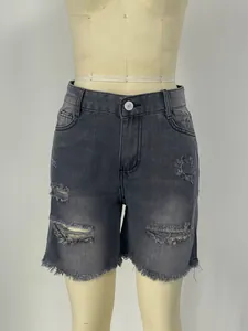 Women's plus size high waisted ripped denim shorts in charcoal grey with fringe hems