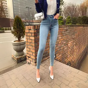 Women's light blue high waist skinny jeans with stretch denim and slim fit design