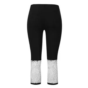 Damen Capri-Leggings in Schwarz mit elegantem weißen Spitzenbesatz am Beinsaum