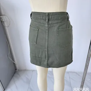 Rear view of army green low-rise denim skirt featuring double back pockets and central seam