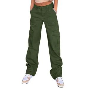Detail of army green high-waisted cargo pants showing large side pockets and cotton texture
