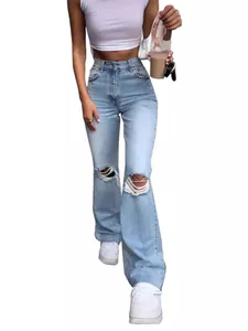 Women's high-waisted distressed flare jeans in light blue denim with knee rips