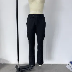 Detail of black motorcycle pants with accordion stretch panels on the knees for flexibility