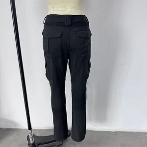 Rear view of men's motorcycle cargo pants showing reinforced waistband and large flap pockets