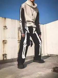 Streetwear set featuring a bone skeleton print hoodie and matching black jogger pants