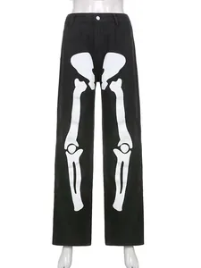 Men's street style black straight denim pants featuring white skeleton bone graffiti print