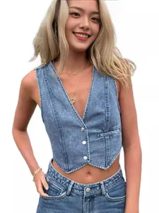 Women's light blue washed denim vest with deep V-neck and slim fit cropped style
