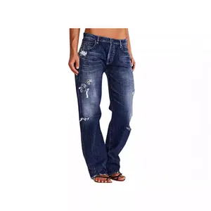 Detail shot of vintage blue distressed jeans featuring ripped knees and straight-leg fit