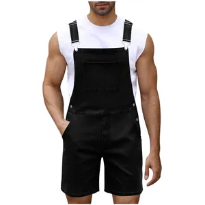 Front detail of men's black denim overalls shorts featuring adjustable metal buckles