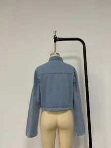 Back view of light blue denim jacket with horizontal stitching and turn-down collar