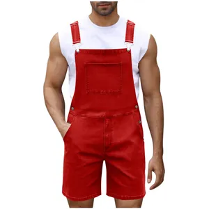 Detail of red denim bib shorts with adjustable metal buckles and chest pocket