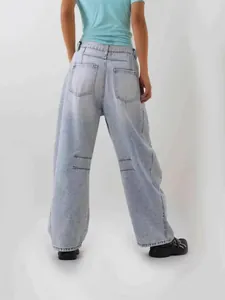 Women high waisted light blue wide leg distressed denim jeans with back pockets