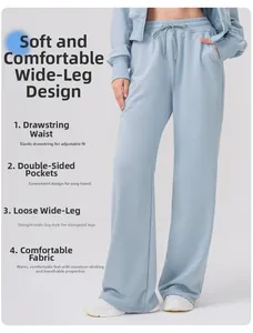 Vue détaillée de la taille à cordon et de la poche latérale sur le pantalon bleu large