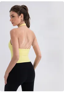 Detailed back view of a lemon yellow halter neck yoga tank top with open back design
