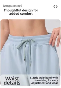 Détail du pantalon de yoga bleu clair à taille haute montrant la ceinture élastique